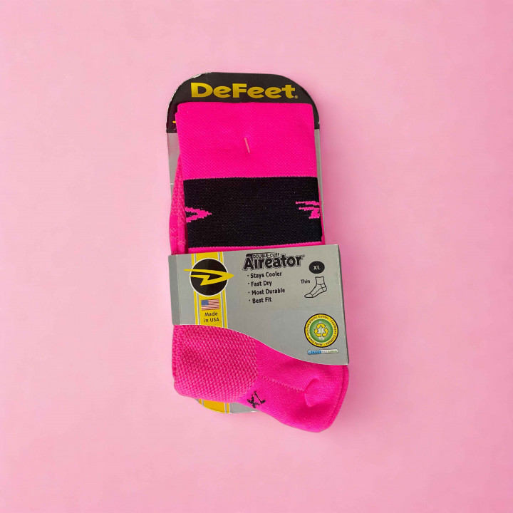 Chaussettes Defeet cyclismo rose ou jaune fluo en vente sur cyclonesocks.com